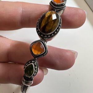 Lori Bonn Sterling silver bracelet with peridot and tiger’s eye